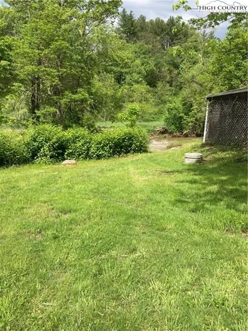a view of a field with an outdoor space
