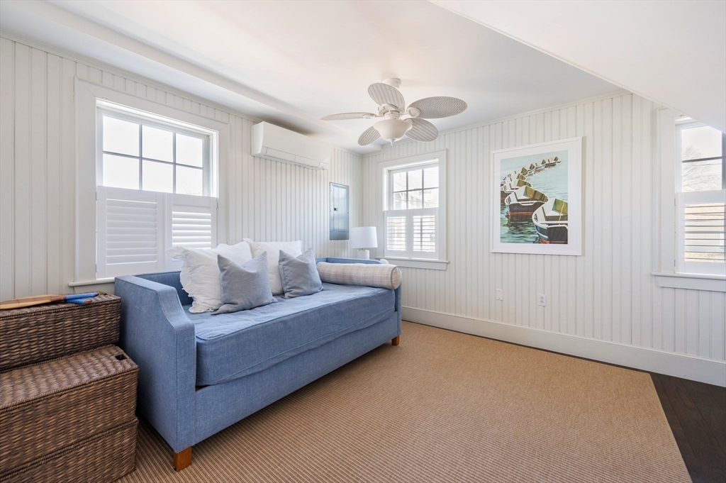 87 Bay Street Hull, MA 02045 - Photo 17 of 30 a living room with furniture and windows