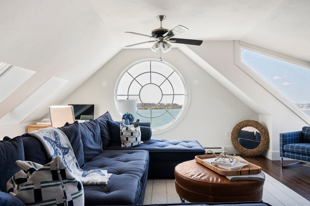 87 Bay Street Hull, MA 02045 - Photo 19 of 30 a living room with furniture and a large mirror