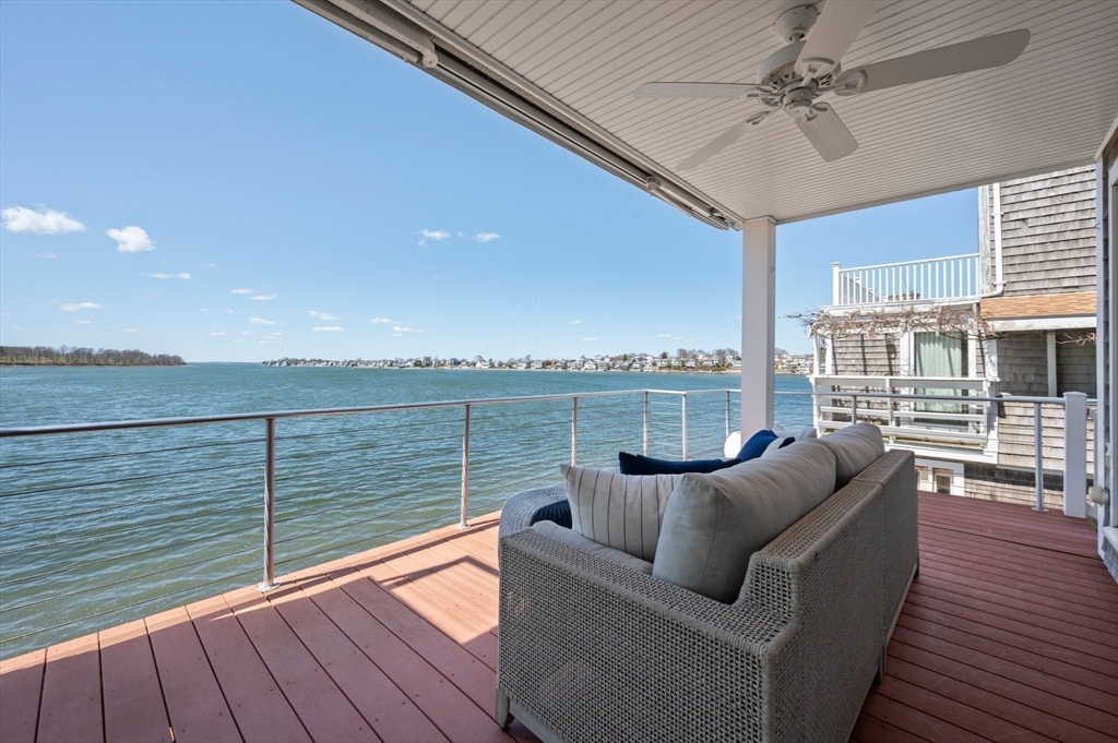 87 Bay Street Hull, MA 02045 - Photo 22 of 30 a view of roof deck with seating space and wooden floor