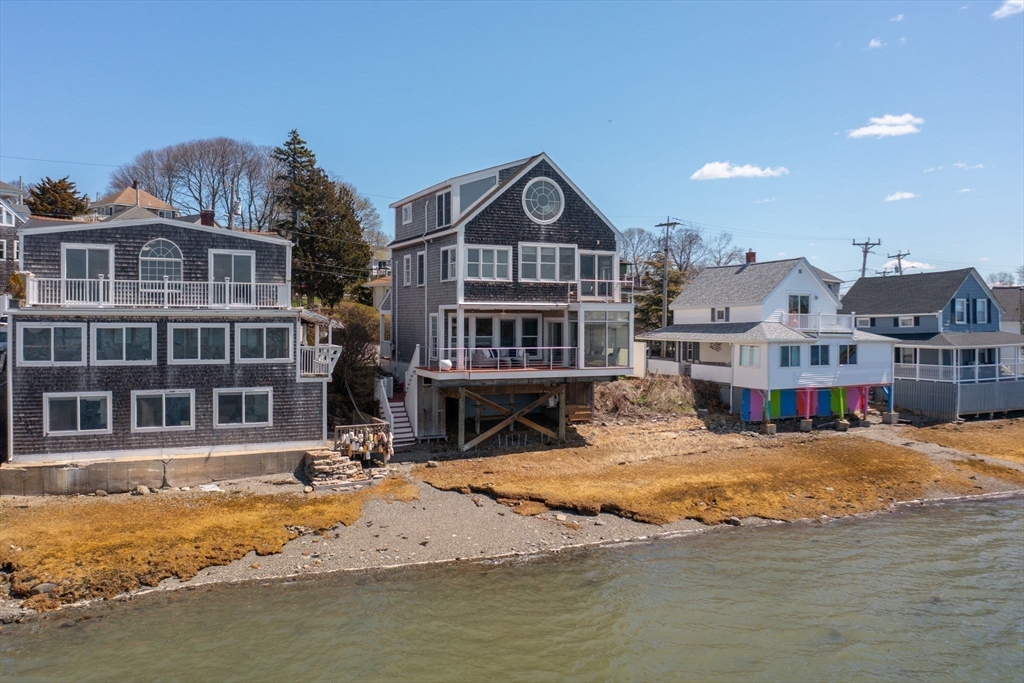 87 Bay Street Hull, MA 02045 - Photo 25 of 30 a view of a house with a swimming pool