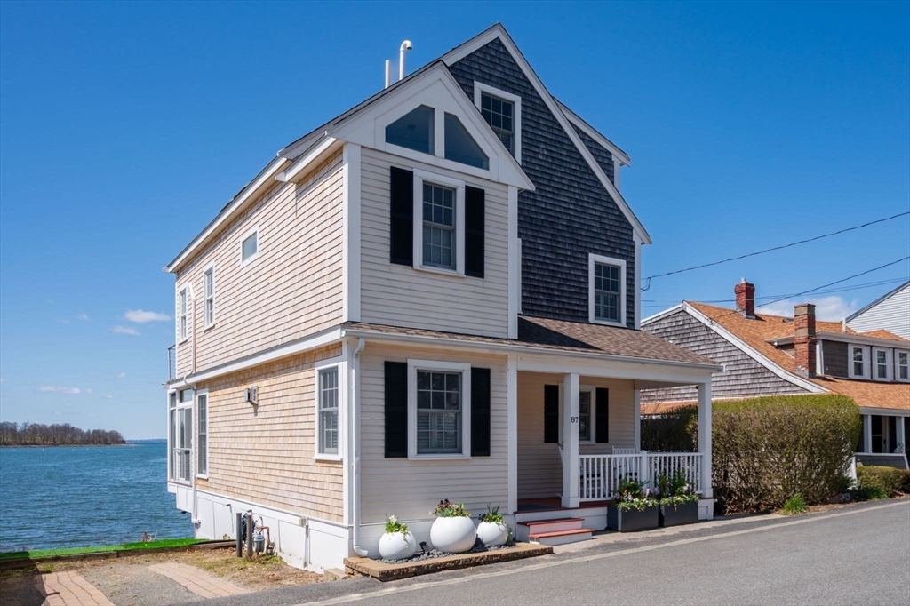 87 Bay Street Hull, MA 02045 - Photo 3 of 30 a front view of a house with garden