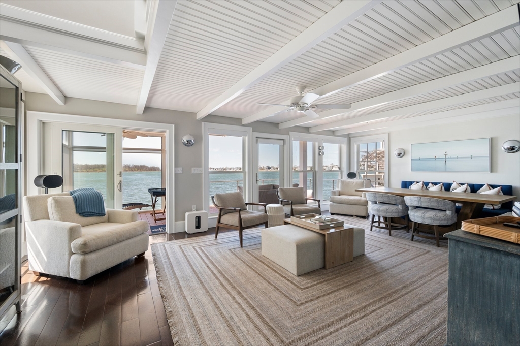 87 Bay Street Hull, MA 02045 - Photo 5 of 30 a living room with furniture and a large window