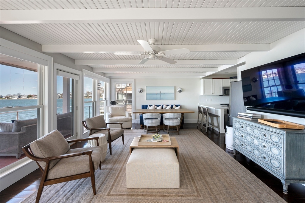 87 Bay Street Hull, MA 02045 - Photo 6 of 30 a living room with furniture and flat screen tv