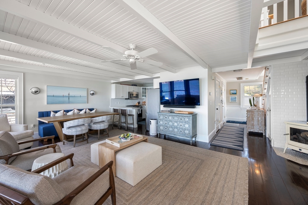 87 Bay Street Hull, MA 02045 - Photo 7 of 30 a living room with furniture and a flat screen tv