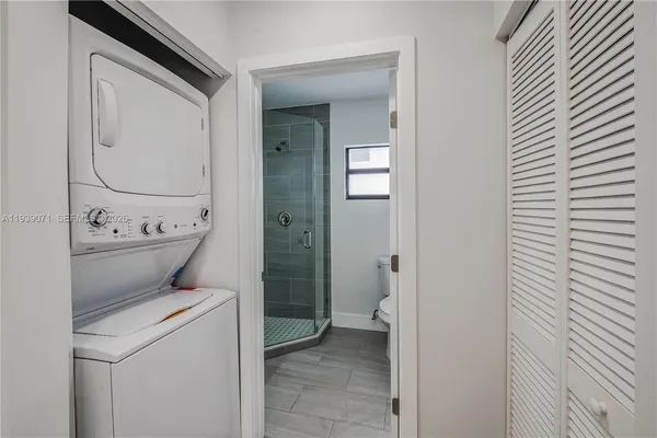 a bathroom with a toilet and a sink