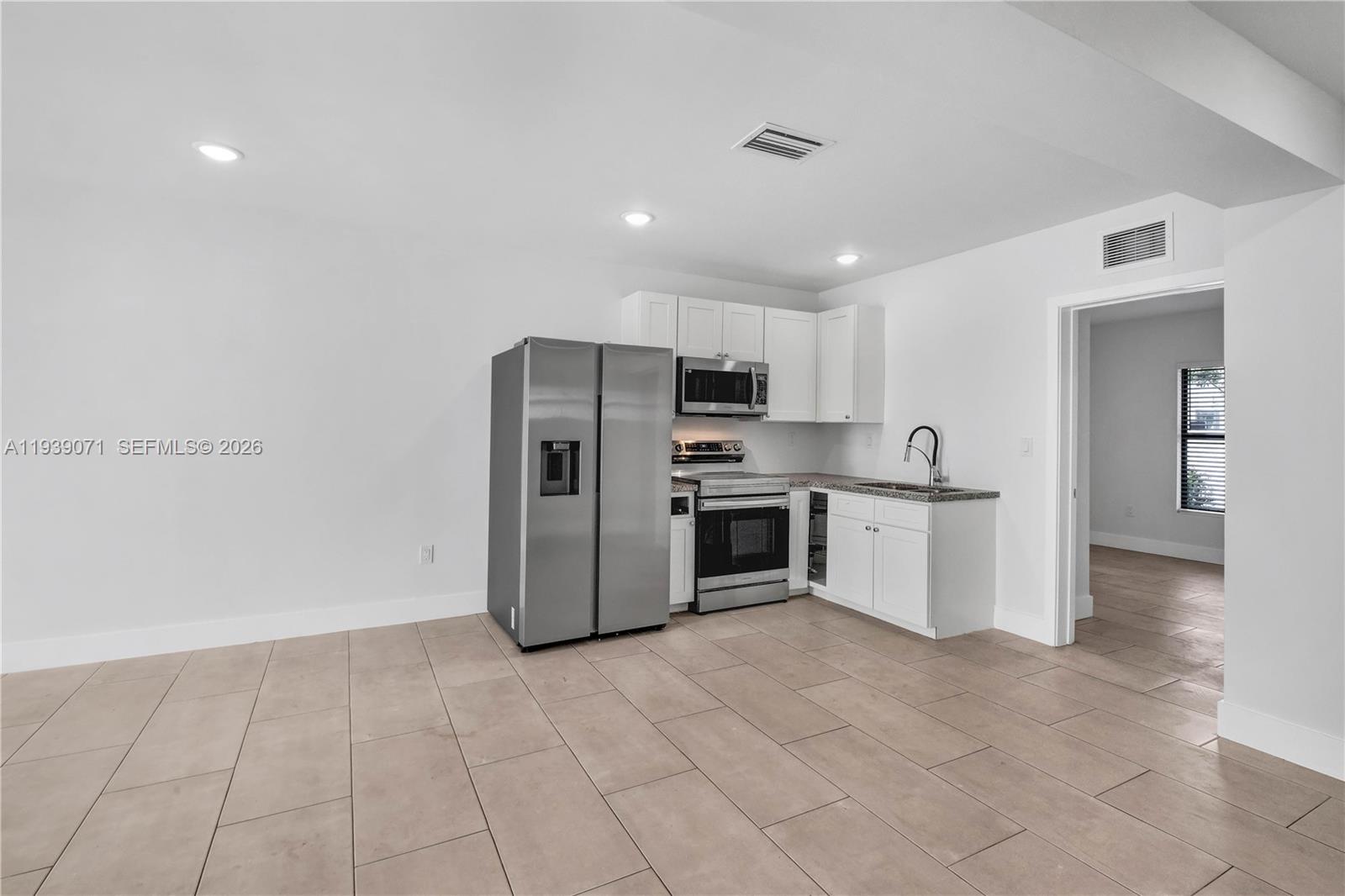 1749 Northwest 64th Street, Unit A Miami, FL 33147 - Photo 6 of 19