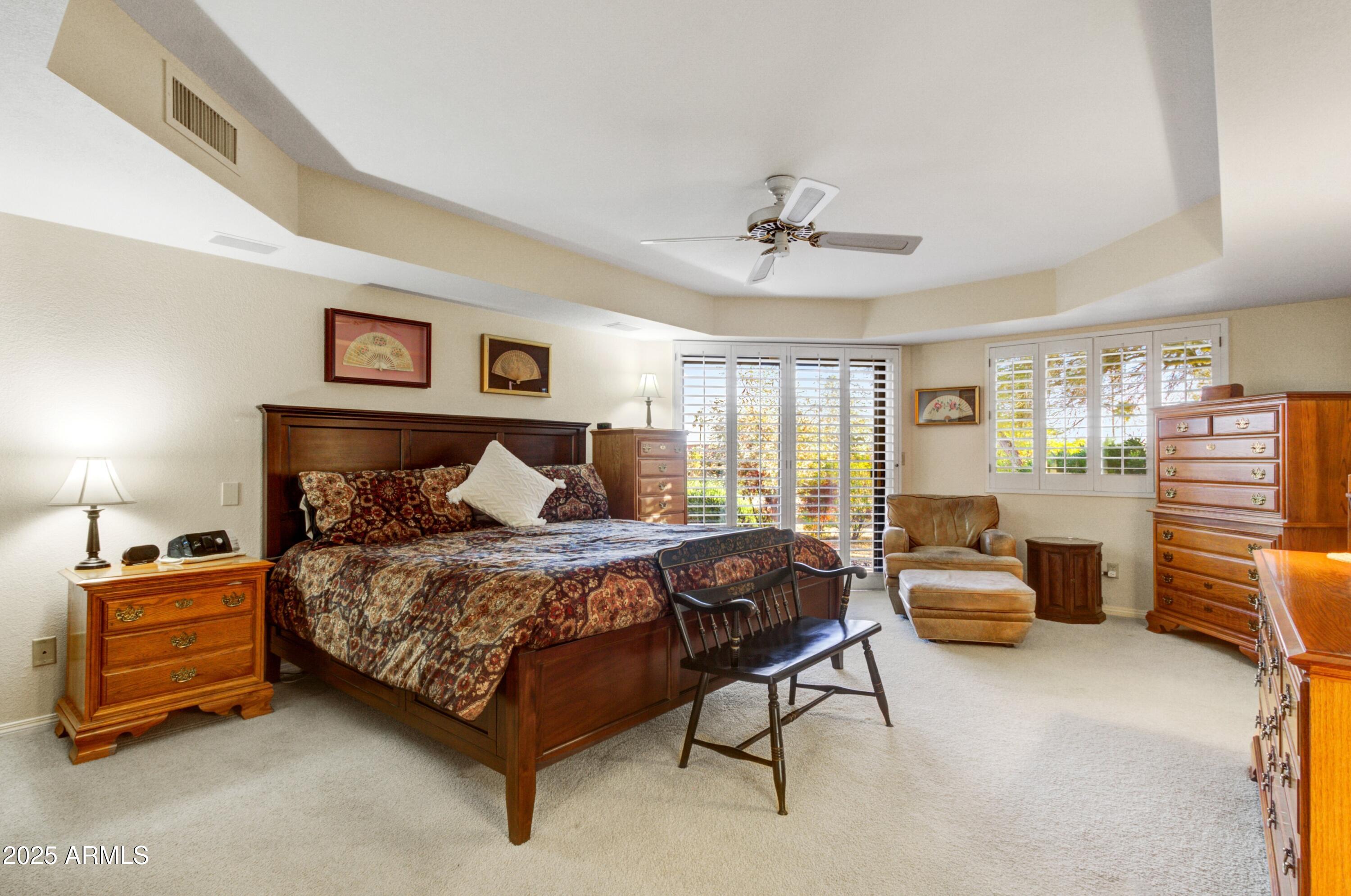 18919 East Reata Drive Rio Verde, AZ 85263 - Photo 13 of 35 a bedroom with a bed and furniture