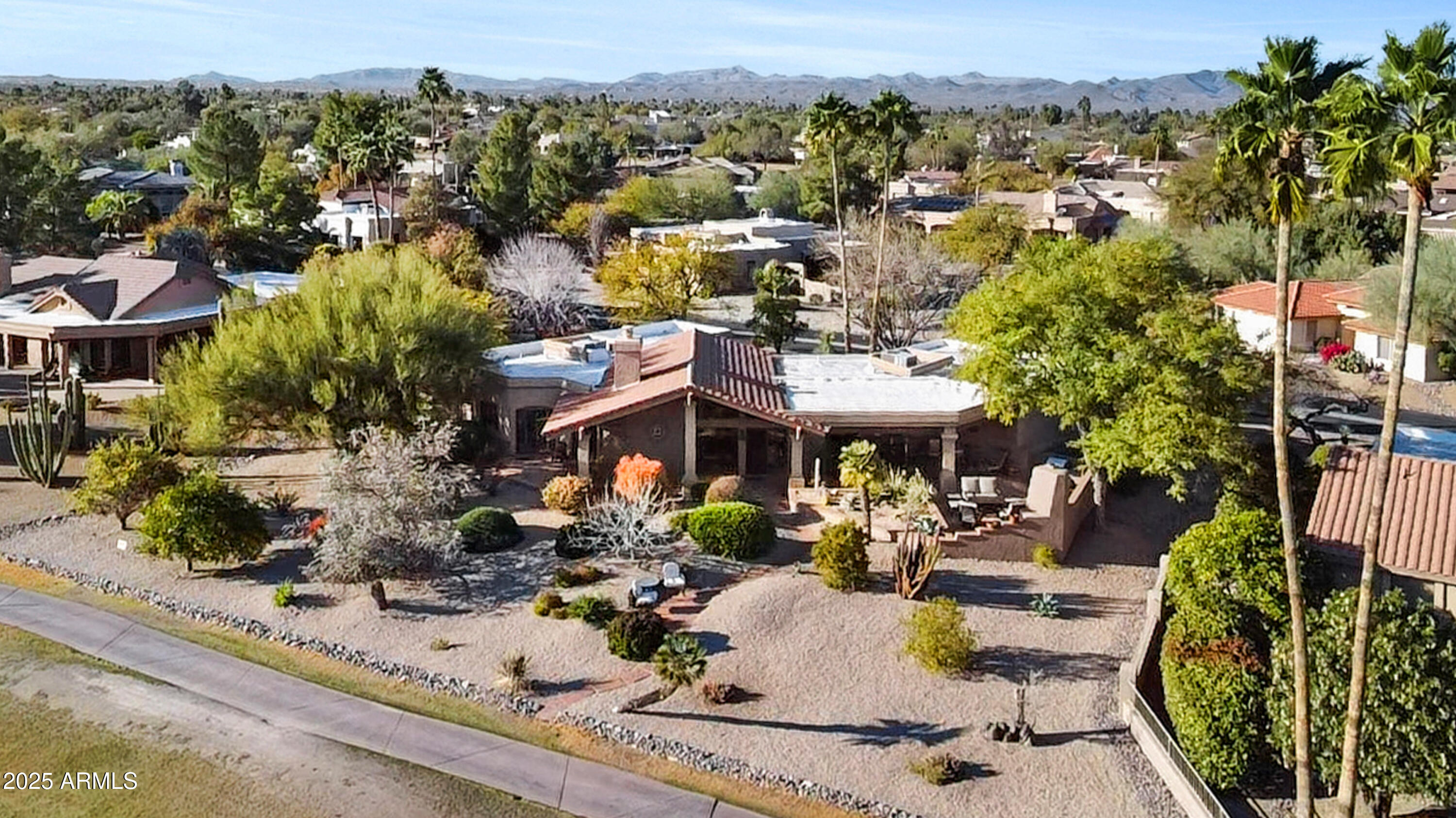 18919 East Reata Drive Rio Verde, AZ 85263 - Photo 2 of 35 an aerial view of a house with a garden