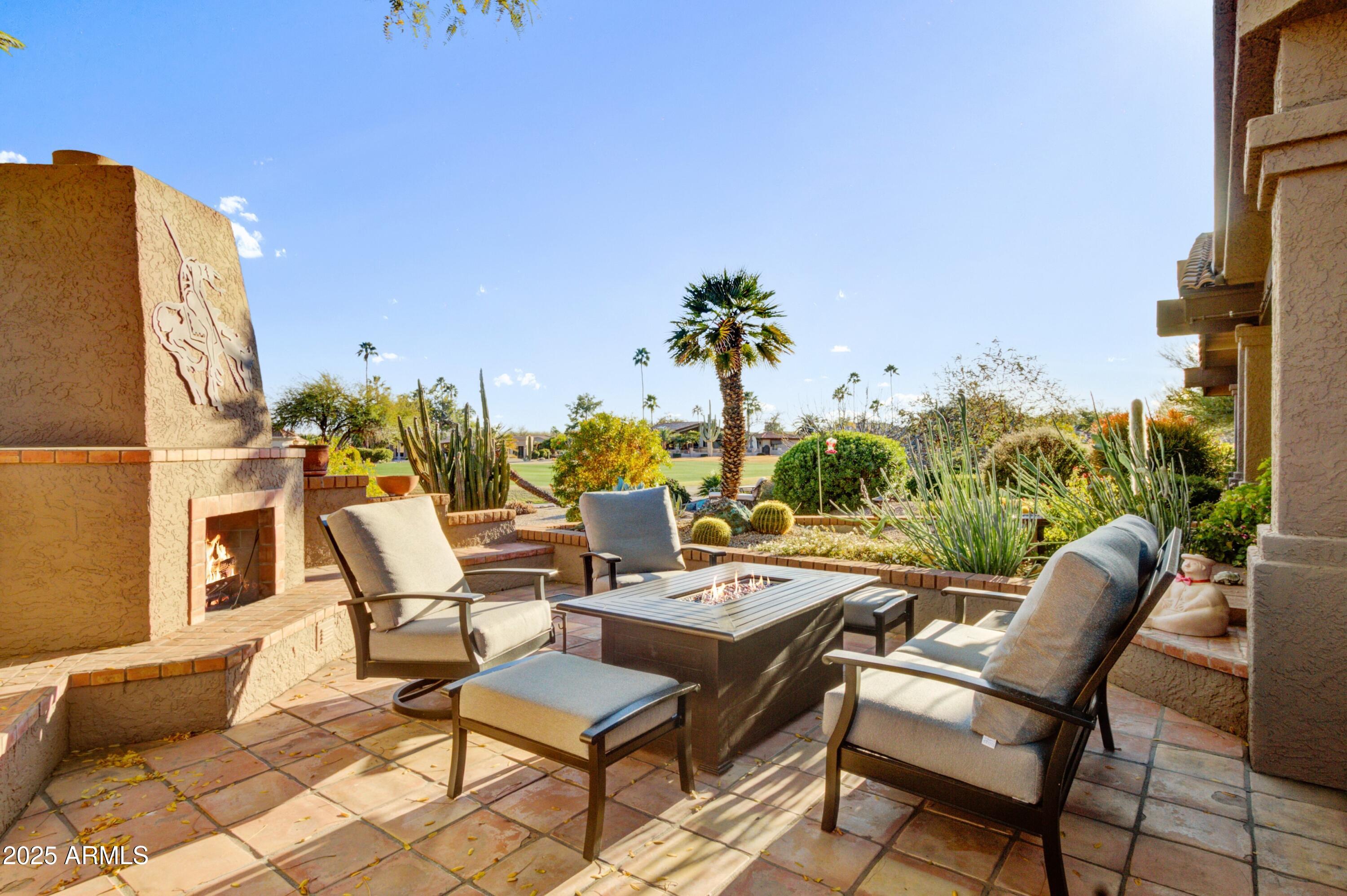 18919 East Reata Drive Rio Verde, AZ 85263 - Photo 23 of 35 a view of a chairs and table in patio