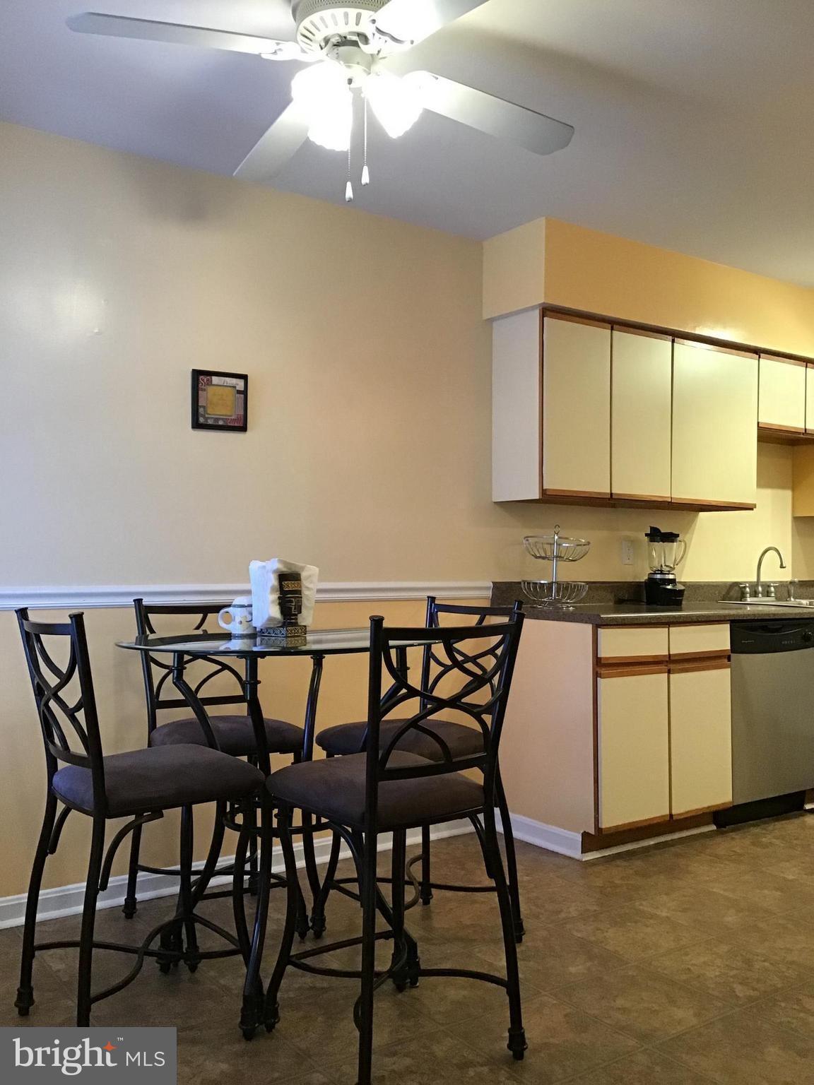 9301 Palmer Place, Unit 40 Laurel, MD 20708 - Photo 4 of 12 Cozy kitchen nook with modern charm.