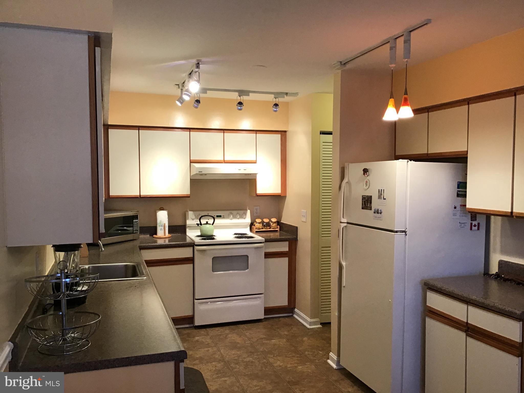 9301 Palmer Place, Unit 40 Laurel, MD 20708 - Photo 6 of 12 Bright and inviting kitchen space.