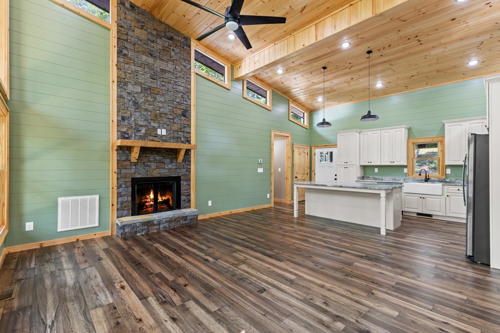 307 Mangum's Trail Blue Ridge, GA 30513 - Photo 17 of 36 a view of kitchen with granite countertop window and a fireplace