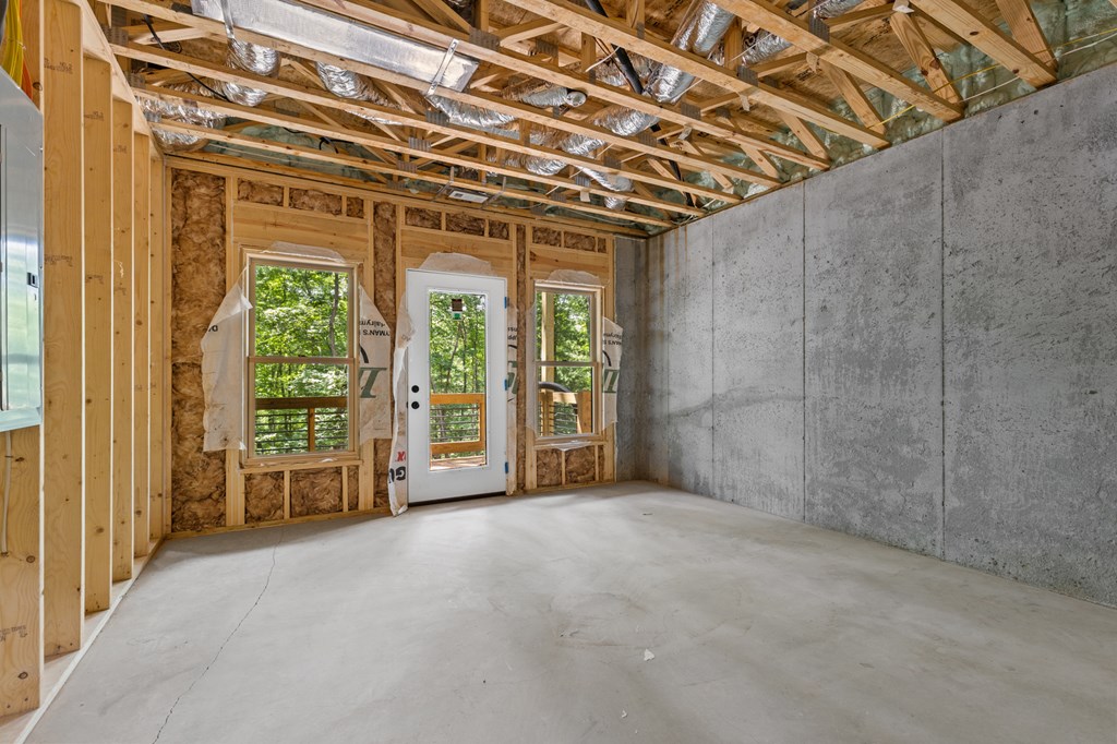 307 Mangum's Trail Blue Ridge, GA 30513 - Photo 30 of 36 a view of an empty room with a window