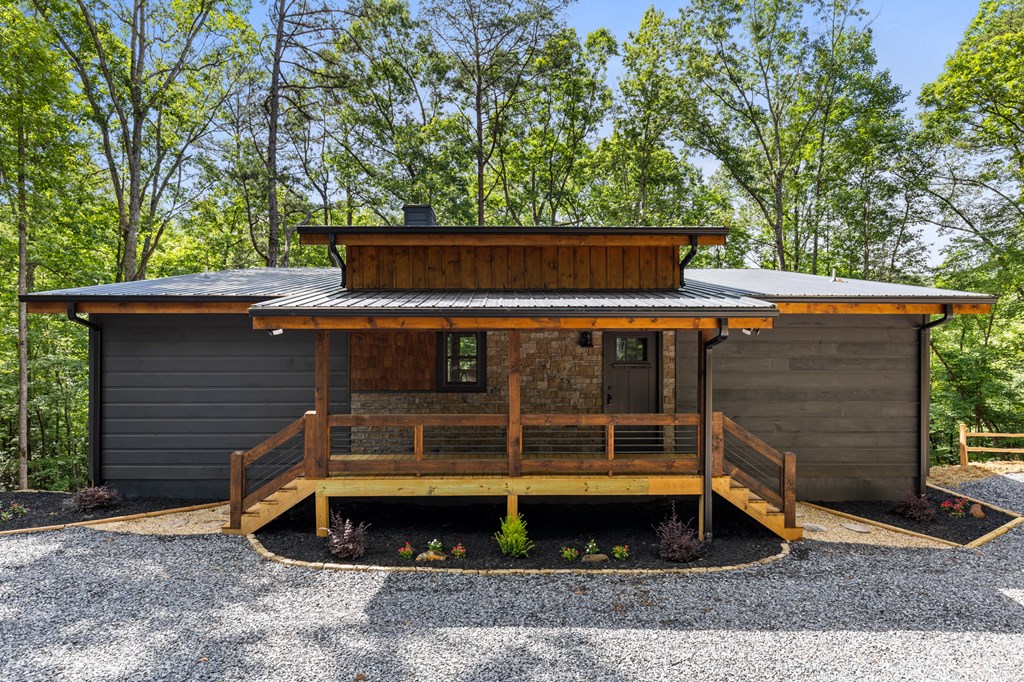307 Mangum's Trail Blue Ridge, GA 30513 - Photo 36 of 36 a view of a small house with a yard