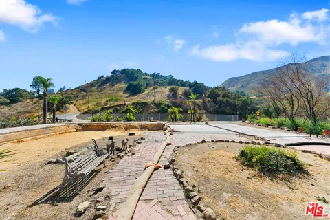 a view of swimming pool with an ocean view