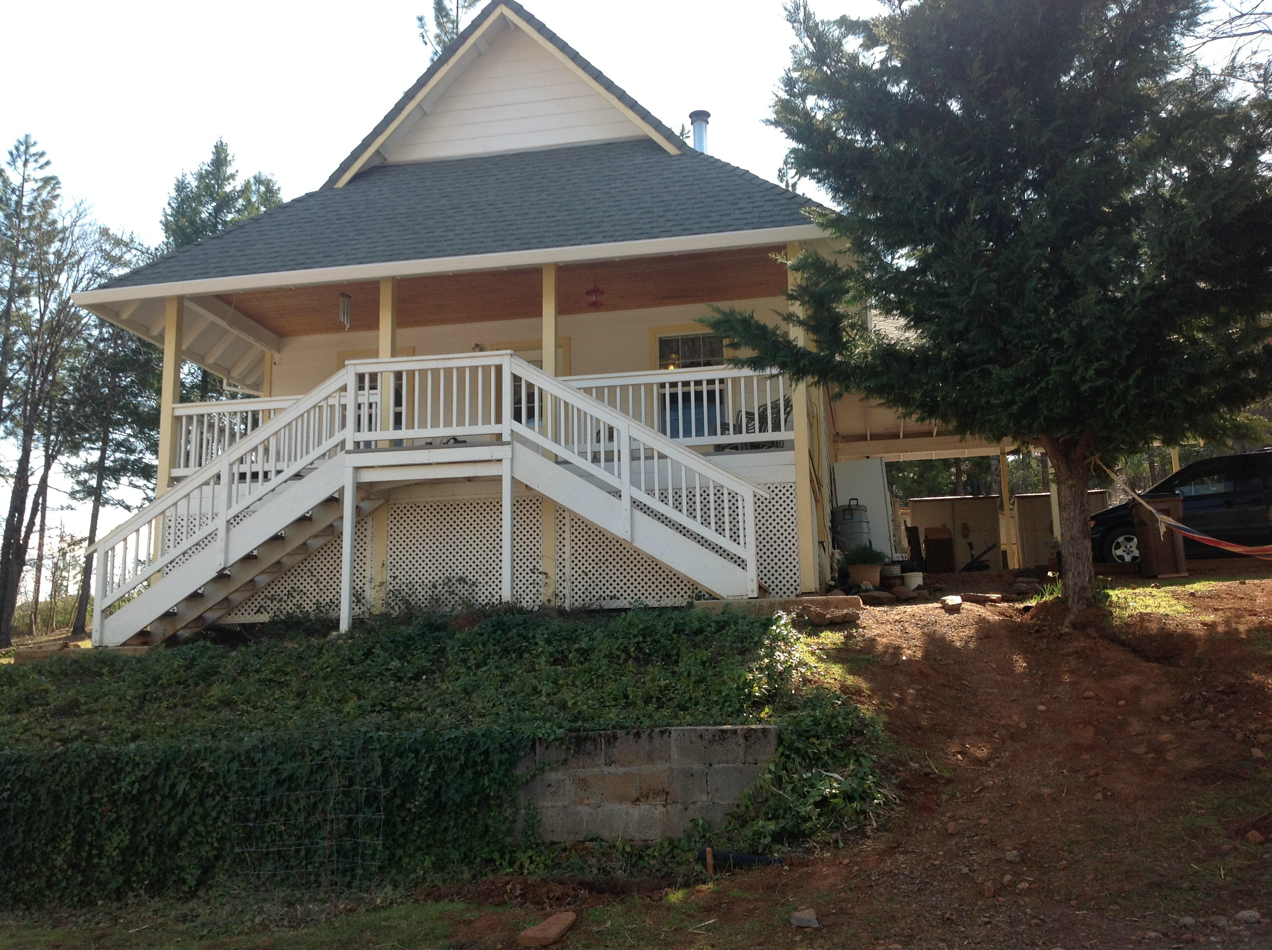 29204 Park Road Bella Vista, CA 96008 - Photo 16 of 41 a view of a house with a yard