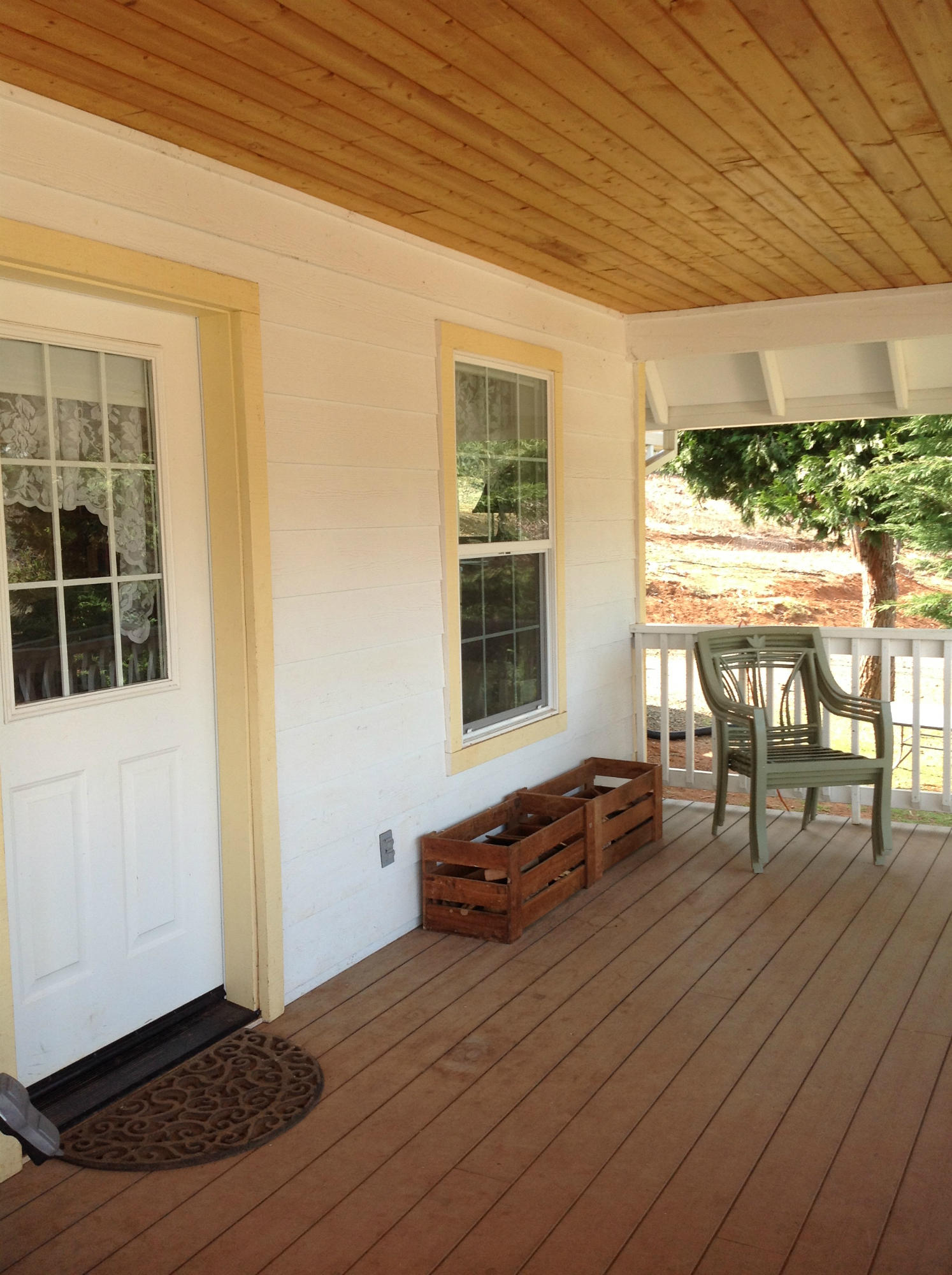 29204 Park Road Bella Vista, CA 96008 - Photo 21 of 41 a view of house with wooden deck and furniture