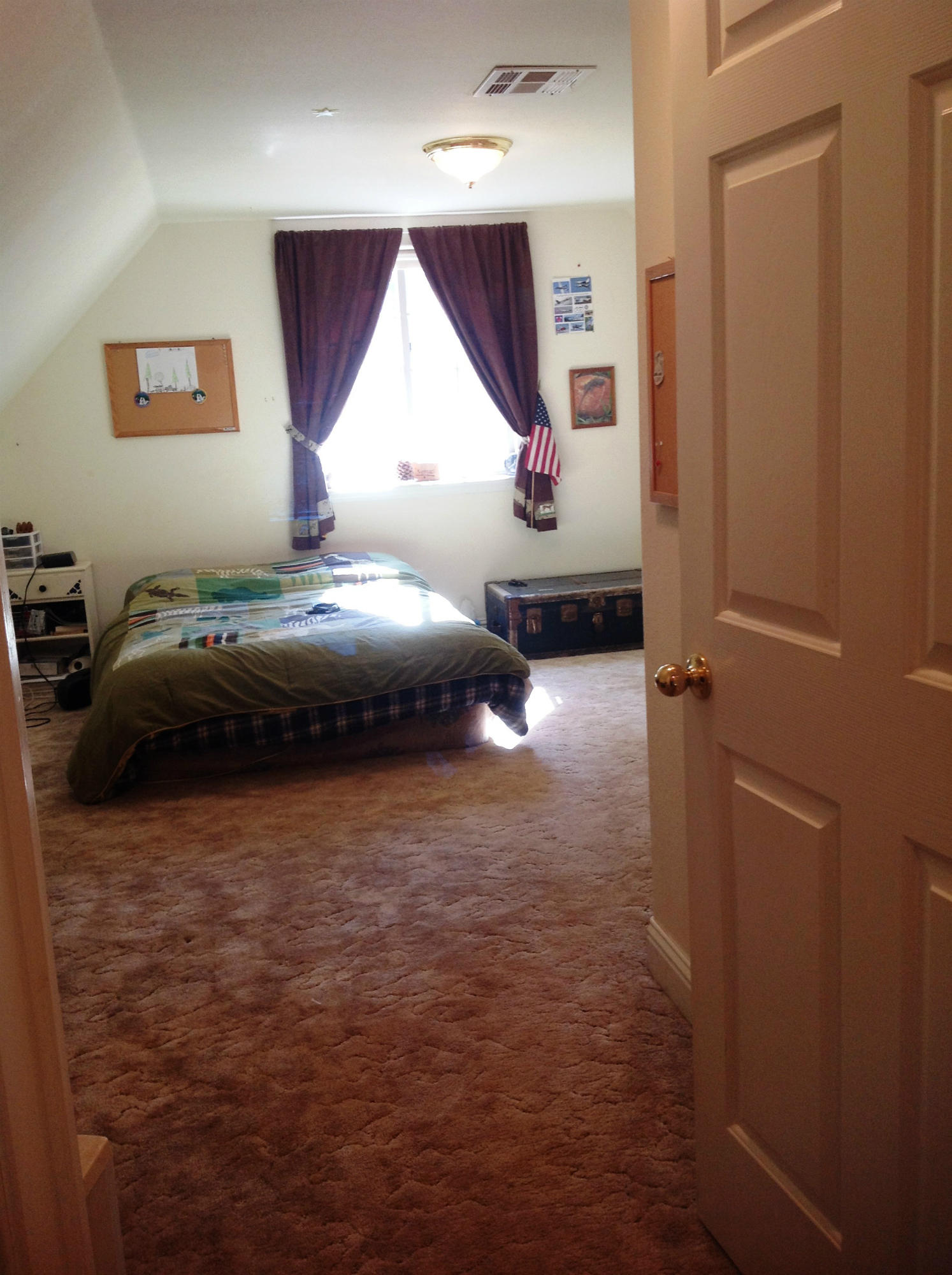 29204 Park Road Bella Vista, CA 96008 - Photo 35 of 41 a bedroom with a bed and a window