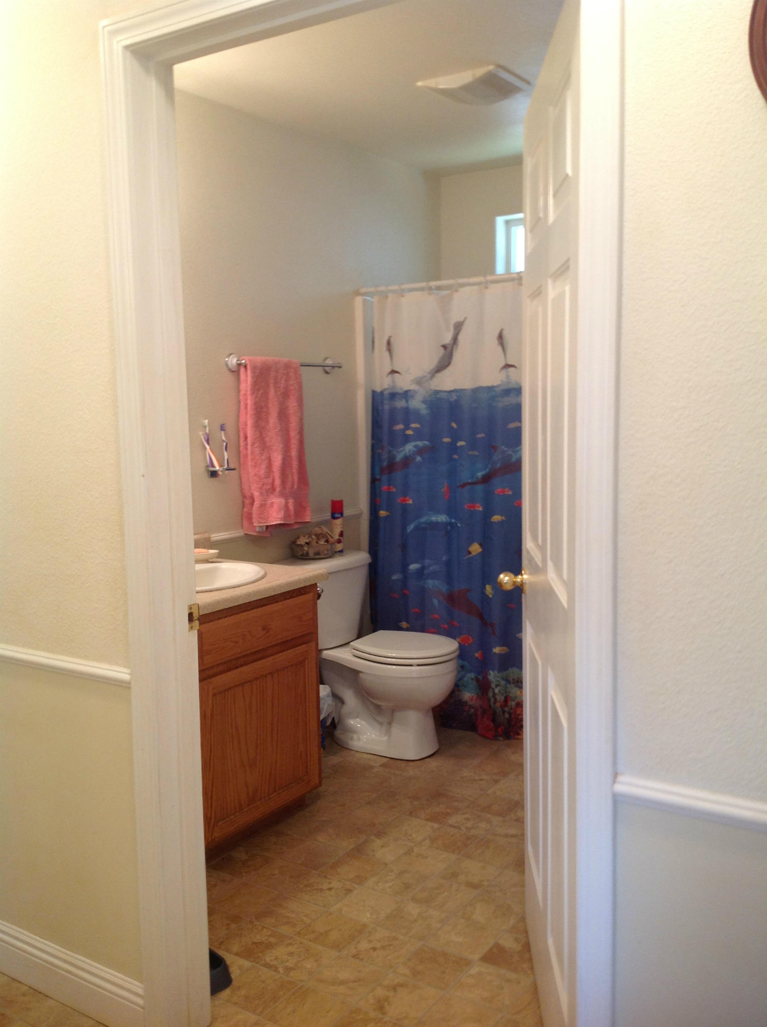 29204 Park Road Bella Vista, CA 96008 - Photo 7 of 41 a bathroom with a granite countertop toilet a sink and a mirror