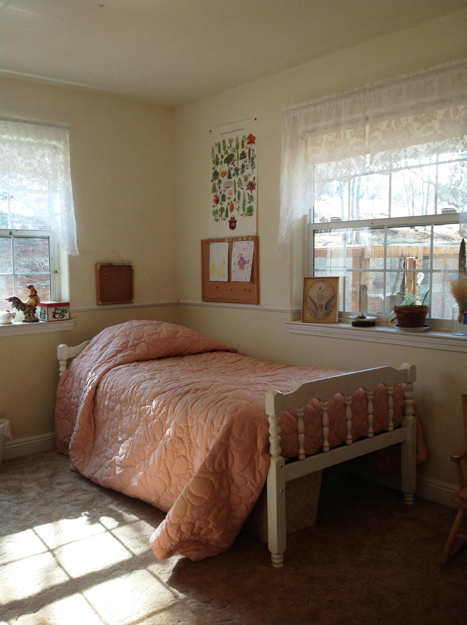 29204 Park Road Bella Vista, CA 96008 - Photo 8 of 41 a bedroom with a bed table and window