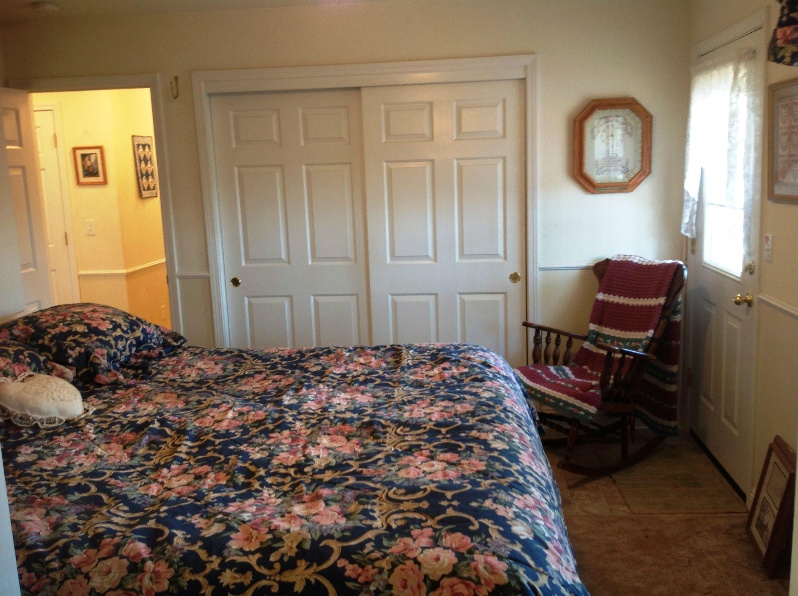 29204 Park Road Bella Vista, CA 96008 - Photo 9 of 41 a bedroom with a bed and chair