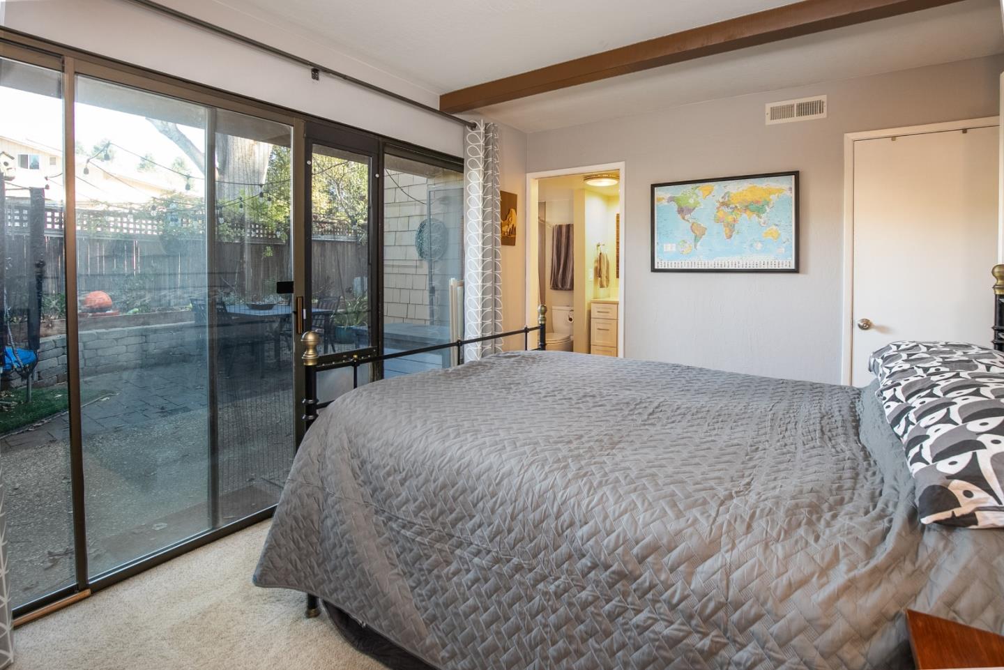 6113 Abbey Road Aptos, CA 95003 - Photo 12 of 20 a bedroom with a bed and a large window