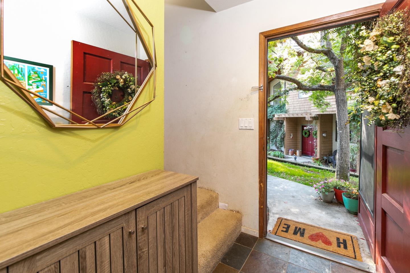 6113 Abbey Road Aptos, CA 95003 - Photo 3 of 20 a view of a room with wooden floor and a balcony