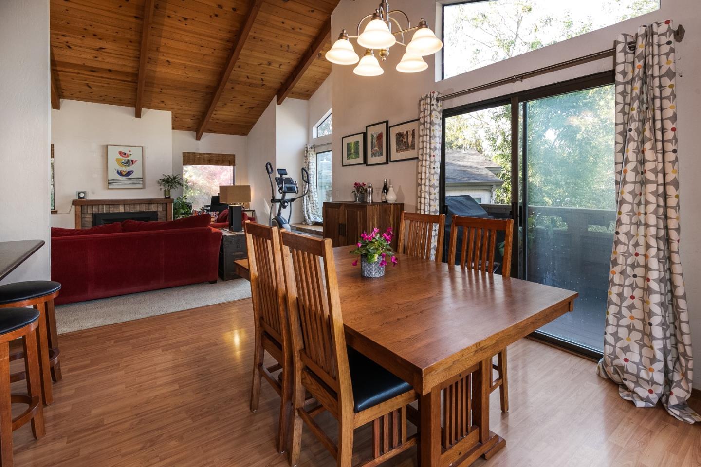 6113 Abbey Road Aptos, CA 95003 - Photo 8 of 20 a view of a dining room with furniture window and wooden floor