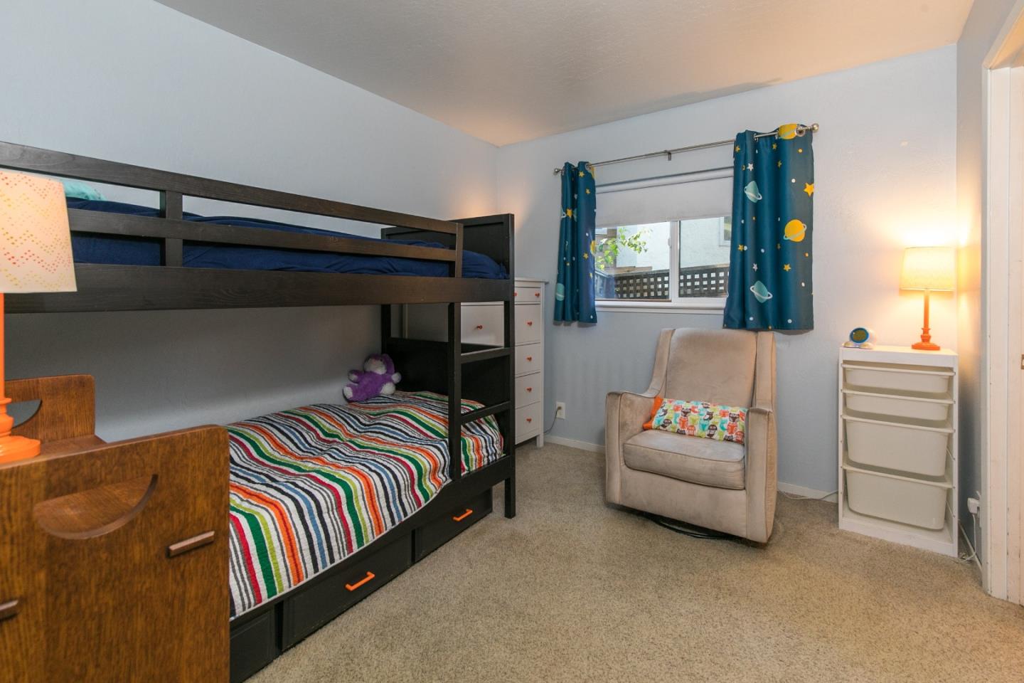 6113 Abbey Road Aptos, CA 95003 - Photo 10 of 20 a bedroom with a bed and large window