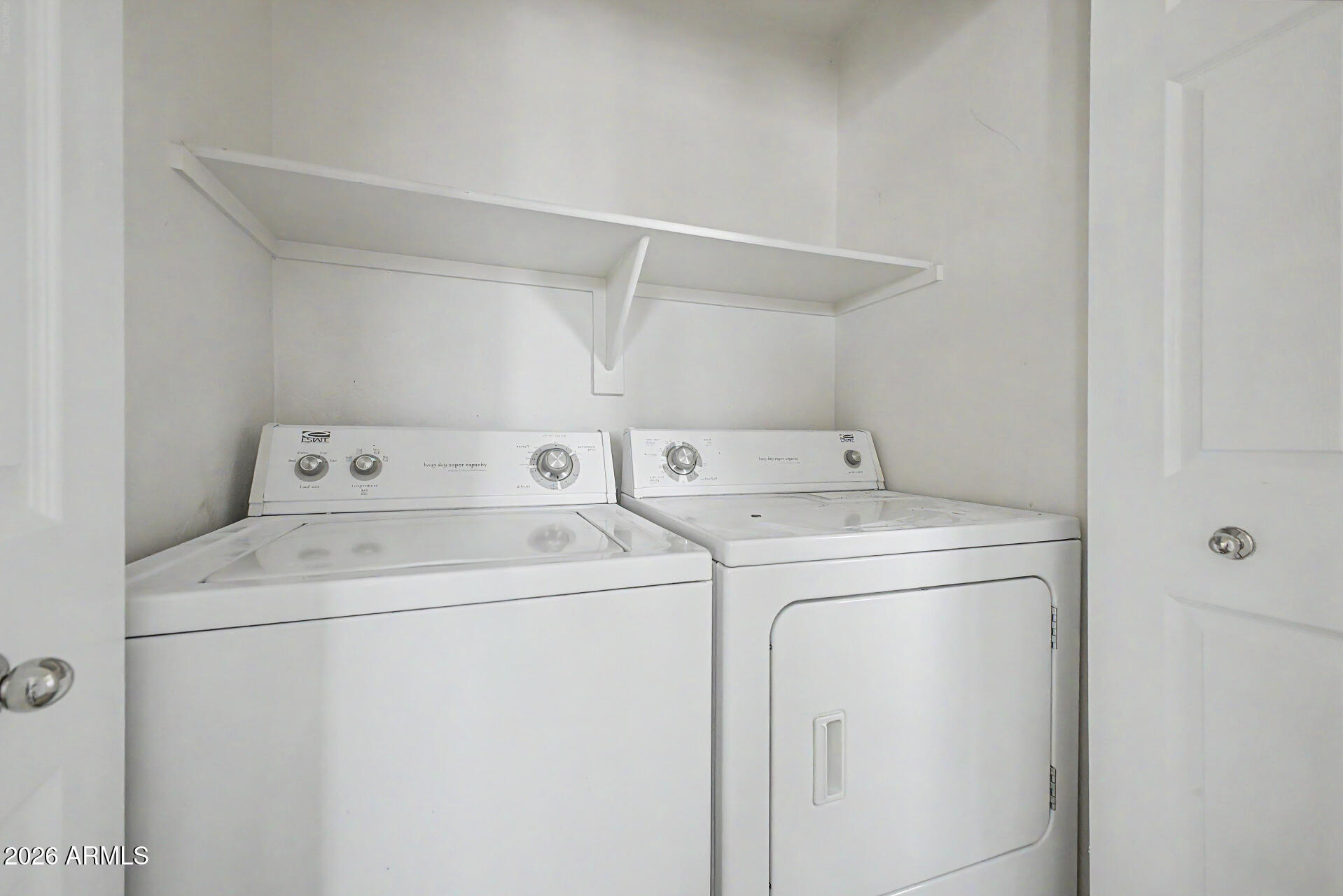 7206 South 12th Way Phoenix, AZ 85042 - Photo 27 of 34 a utility room with dryer and washer