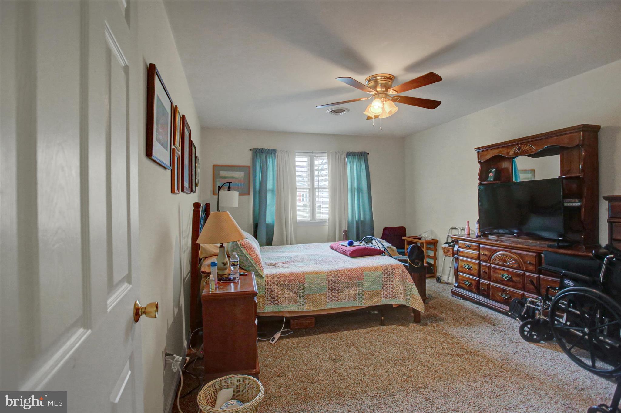227 Minnich Road Chambersburg, PA 17201 - Photo 23 of 31 a bedroom with bed and a flat tv screen on dresser