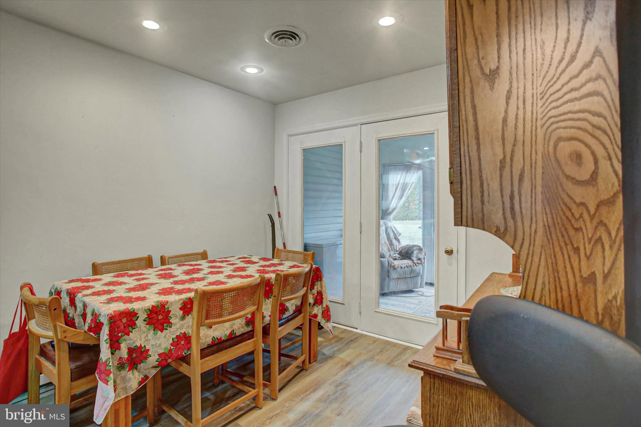 227 Minnich Road Chambersburg, PA 17201 - Photo 7 of 31 a bedroom with a bed and wooden floor