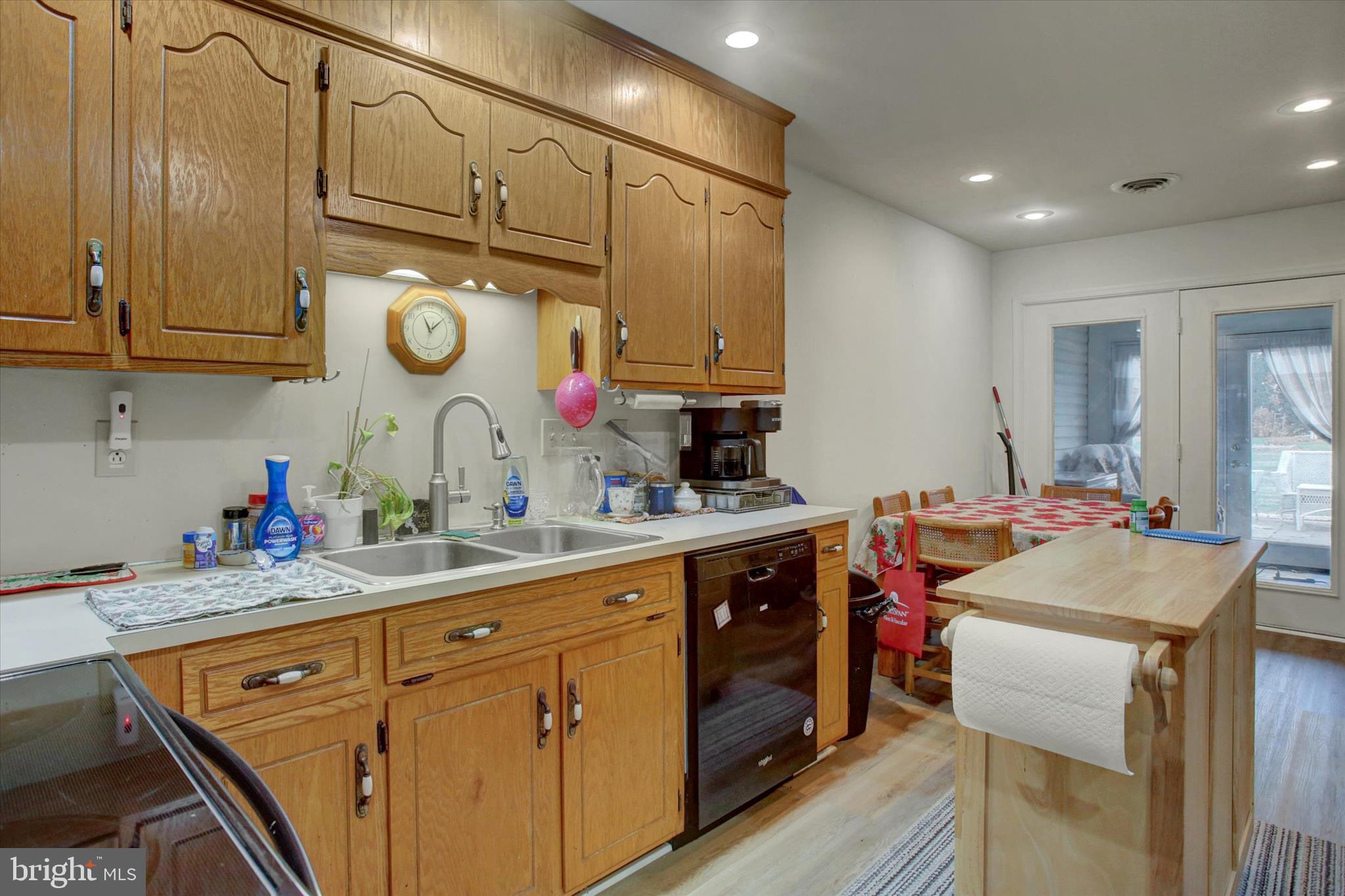 227 Minnich Road Chambersburg, PA 17201 - Photo 10 of 31 a kitchen that has a lot of cabinets in it and wooden floors