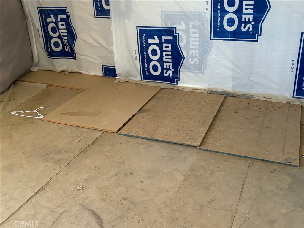 37023 Rabbit Springs Road Lucerne Valley, CA 92356 - Photo 8 of 9 a view of a room with wall paintings and a wall