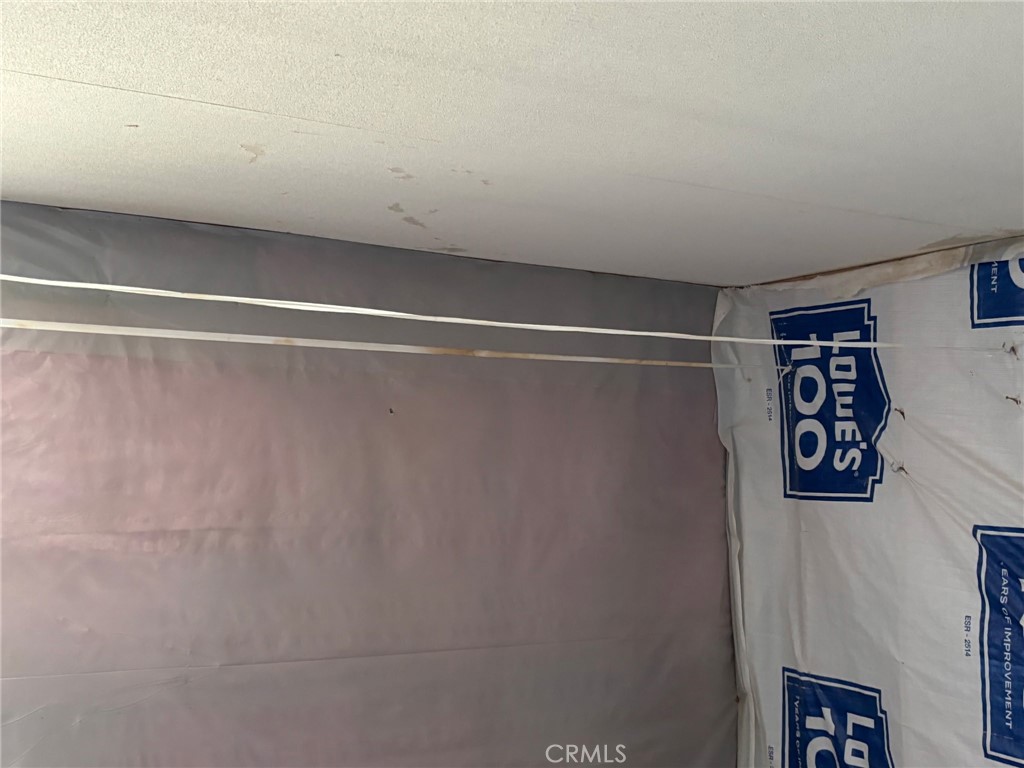 37023 Rabbit Springs Road Lucerne Valley, CA 92356 - Photo 9 of 9 a view of a wall with rack on the wall