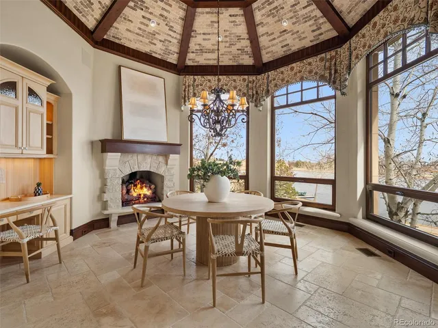 a bedroom with a bed and a fireplace