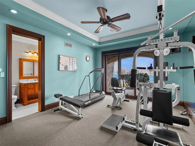 a large kitchen with stainless steel appliances granite countertop a stove and a refrigerator