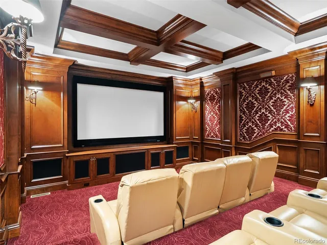 a view of a livingroom with a ceiling fan and window
