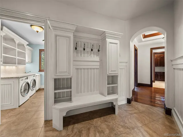 a view of a chairs and table in the balcony