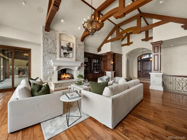 a large kitchen with a table and chairs