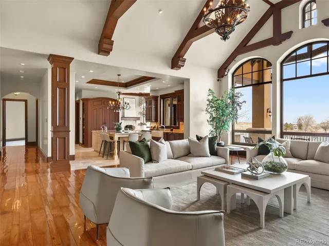 a view of a dining room with furniture and window