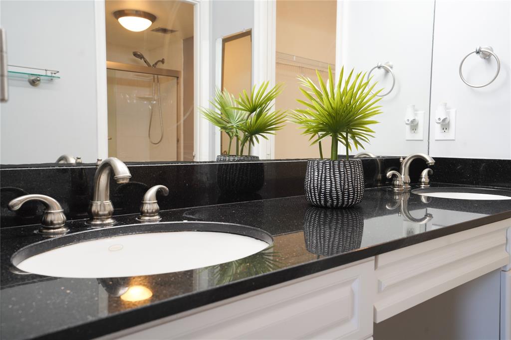 7 Royal Palm Way, Unit 304 Boca Raton, FL 33432 - Photo 15 of 30 a bathroom with a sink and a mirror