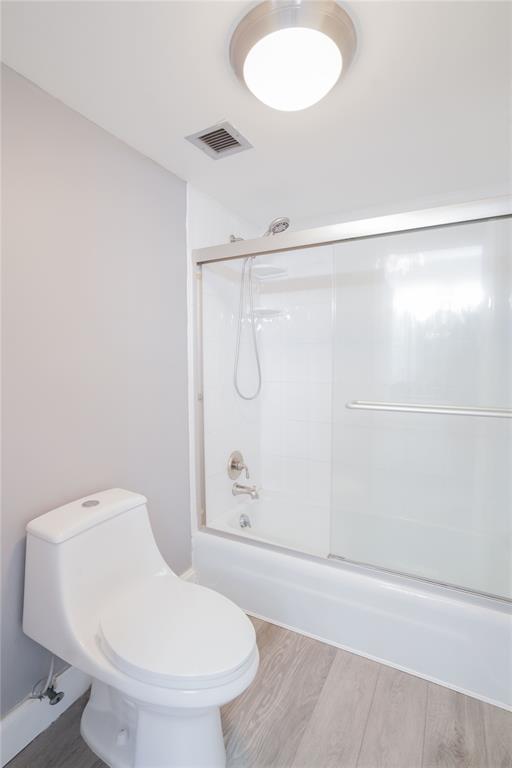 7 Royal Palm Way, Unit 304 Boca Raton, FL 33432 - Photo 16 of 30 a bathroom with a toilet and a shower