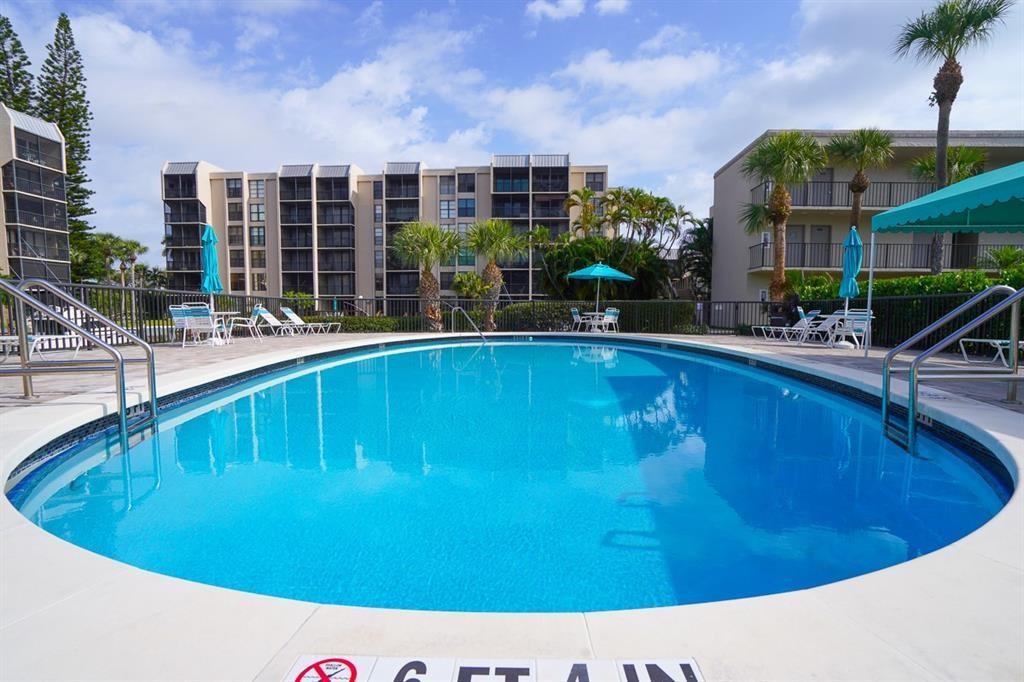 7 Royal Palm Way, Unit 304 Boca Raton, FL 33432 - Photo 24 of 30 a view of a swimming pool with a patio