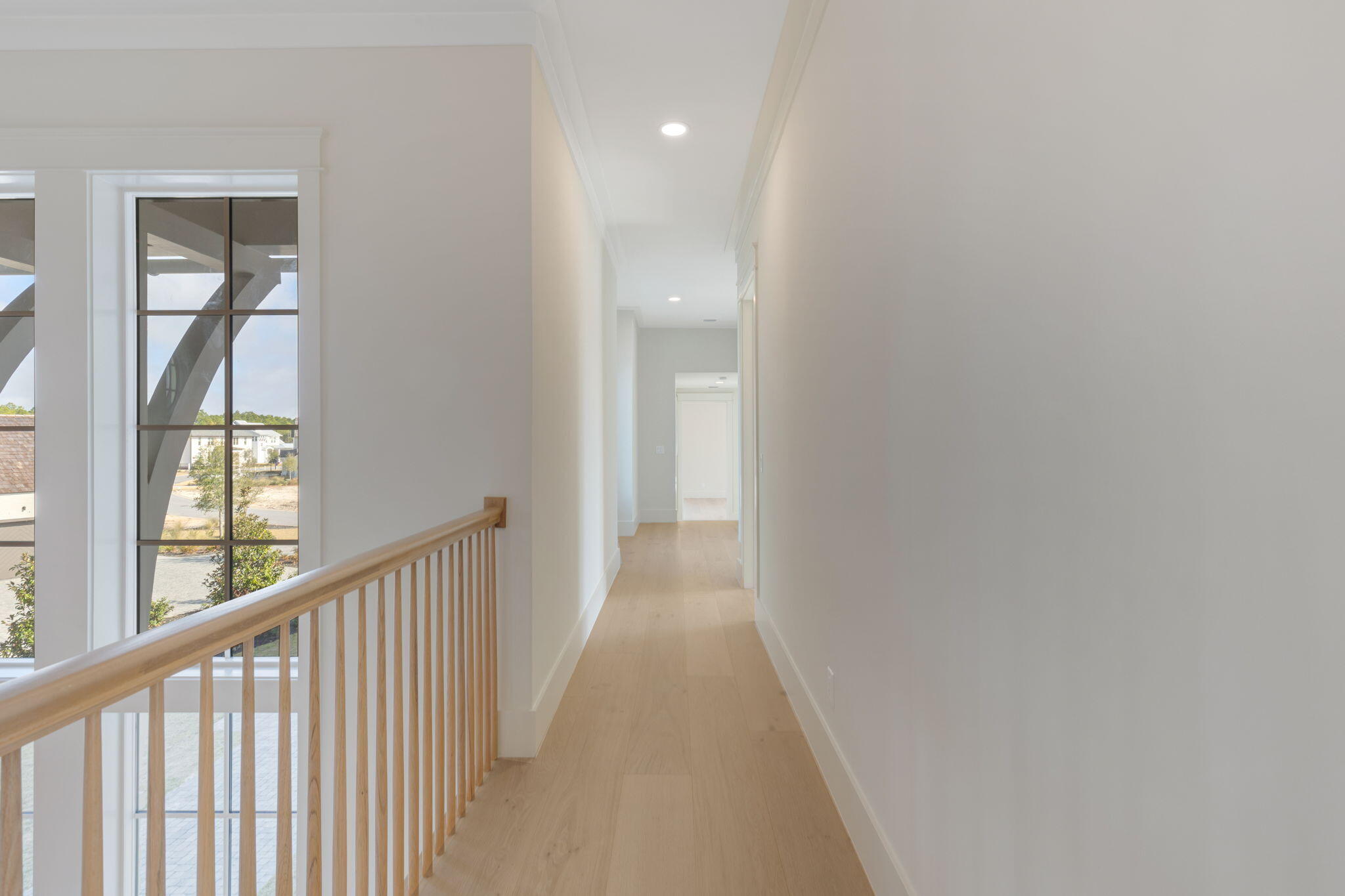 31 Norman Ct Inlet Beach Inlet Beach, FL 32461 - Photo 67 of 104 a view of a hallway with wooden floor and a window
