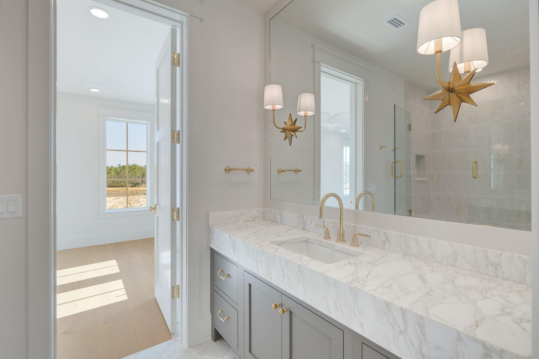 31 Norman Ct Inlet Beach Inlet Beach, FL 32461 - Photo 74 of 104 a bathroom with a sink vanity granite and a mirror