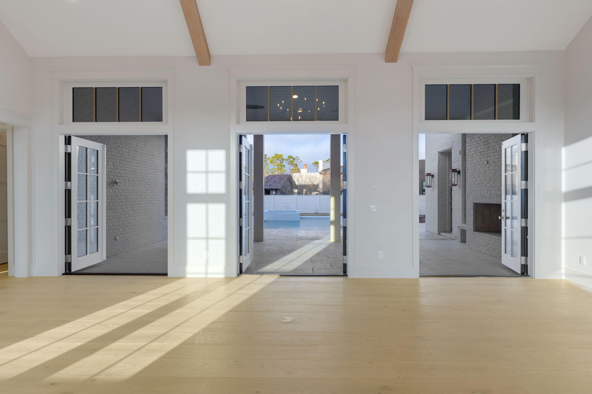 31 Norman Ct Inlet Beach Inlet Beach, FL 32461 - Photo 78 of 104 a view of a hallway with wooden floor and livingroom