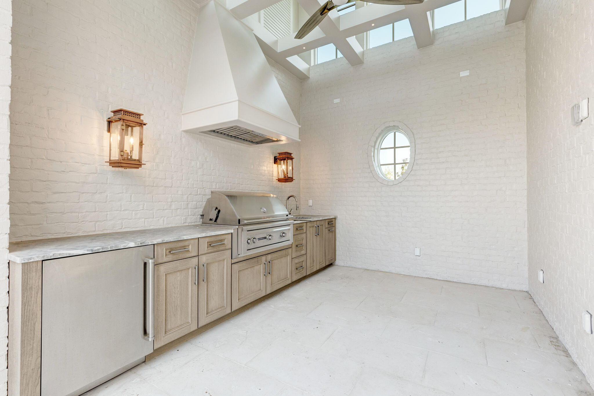 31 Norman Ct Inlet Beach Inlet Beach, FL 32461 - Photo 84 of 104 a large white kitchen with a sink and dishwasher a stove with wooden floor