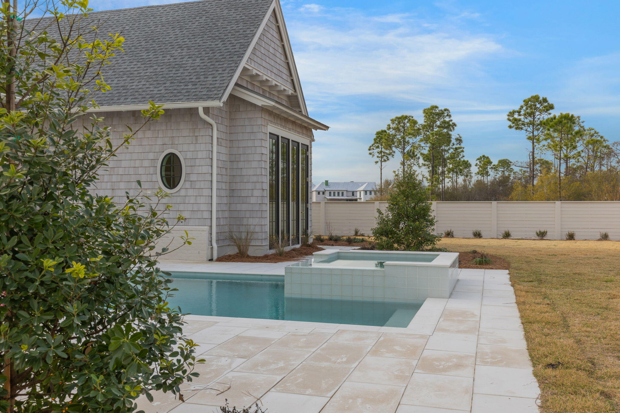 31 Norman Ct Inlet Beach Inlet Beach, FL 32461 - Photo 94 of 104 a view of swimming pool with outdoor seating and house in the background